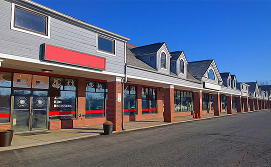 Suburban strip retail center with multiple storefronts